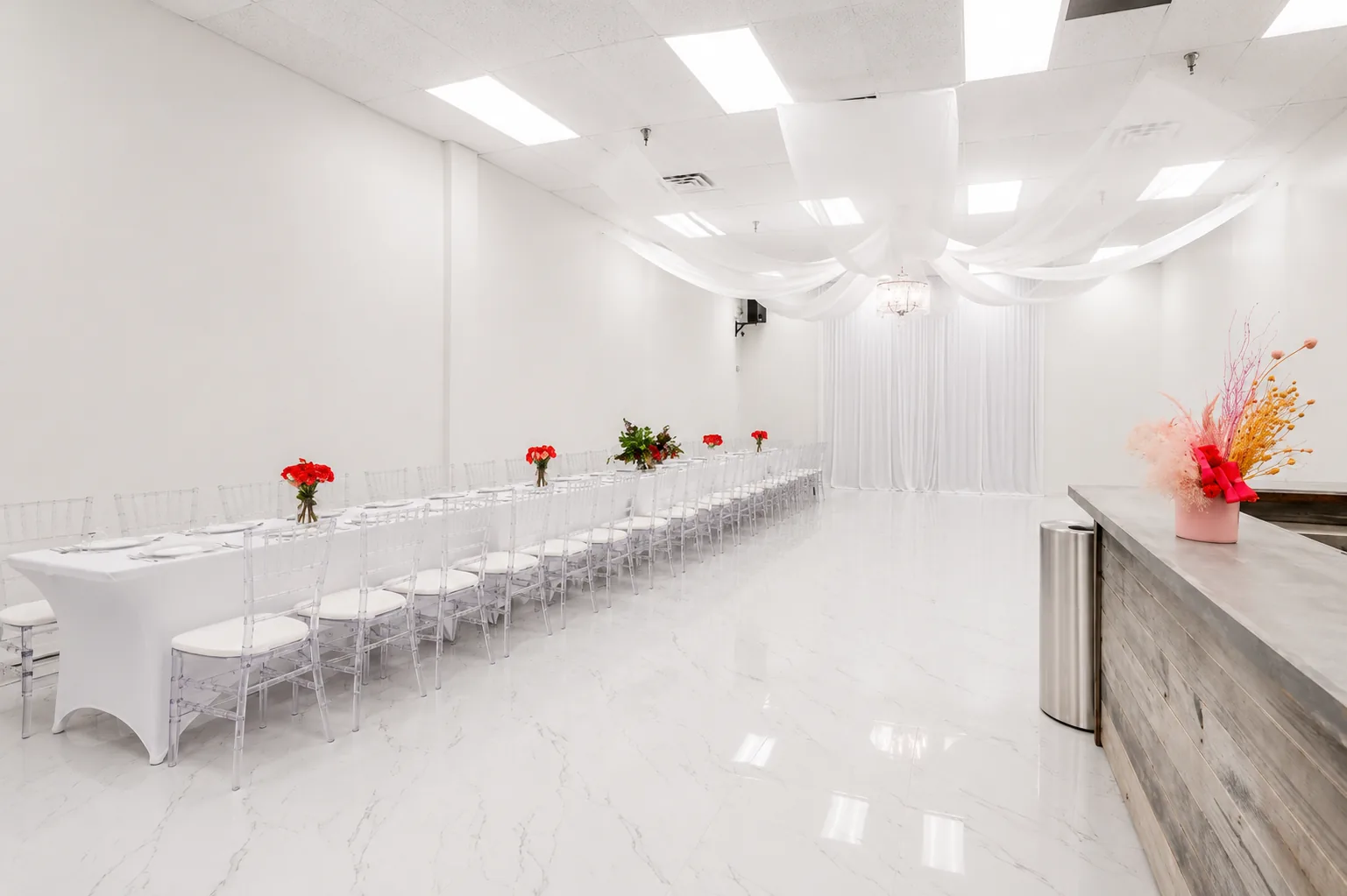 LAYD Spaces Northwest Dallas flagship venue interior with draped ceiling and chandelier
